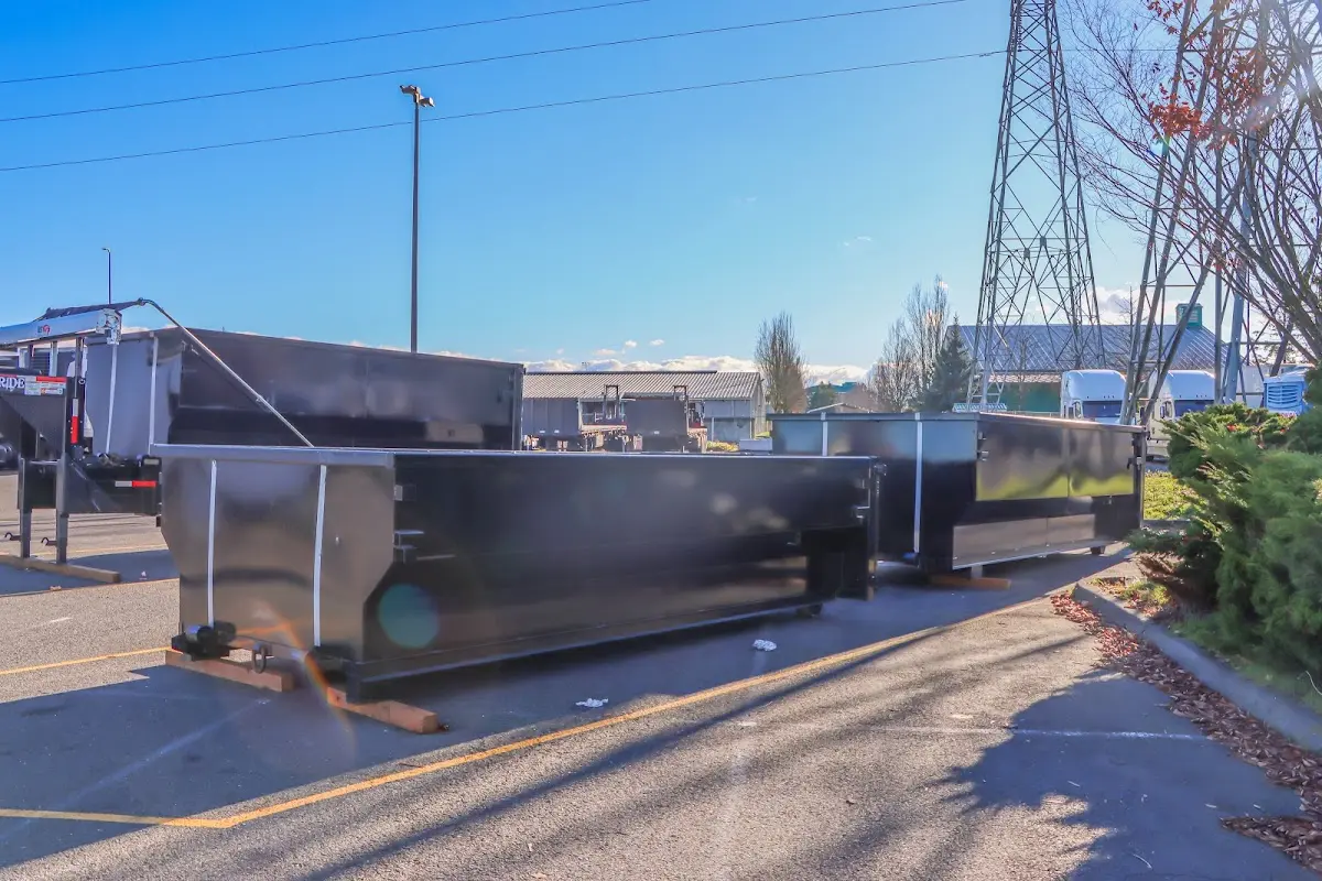 Roll-off dumpster ready for waste disposal at job site for Roll Off Dumpster Rental in Seven Oaks